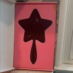 Jeffree Star star-shaped mirror.